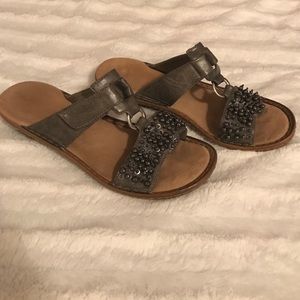 Dark gray, embellished rieker sandals.